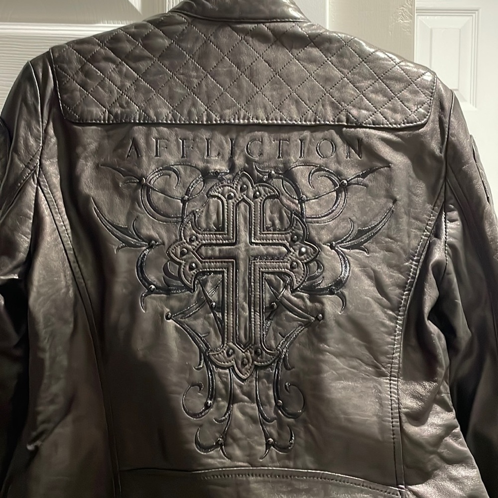 Women’s size large affliction, leather jacket. Never been worn .